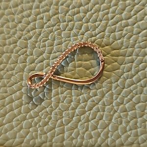 Kay's Dainty 10K white gold twisted teardrop pendant with .20 CTW diamonds